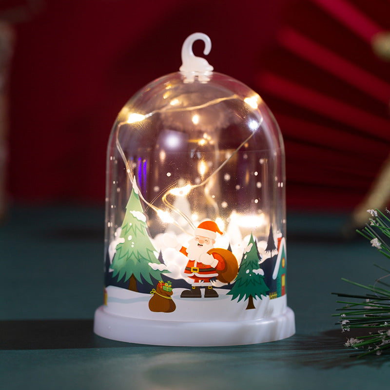 Lumivale | Lanterna natalizia a LED con paesaggio invernale illuminato sotto una cupola
