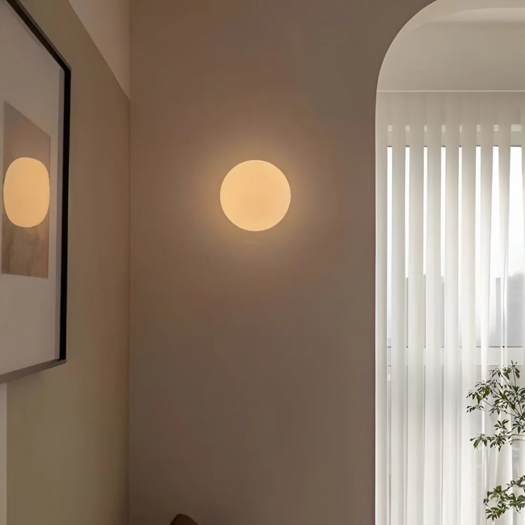 Pietra Luma | Applique da parete in vetro rotonda con luce LED bianco caldo