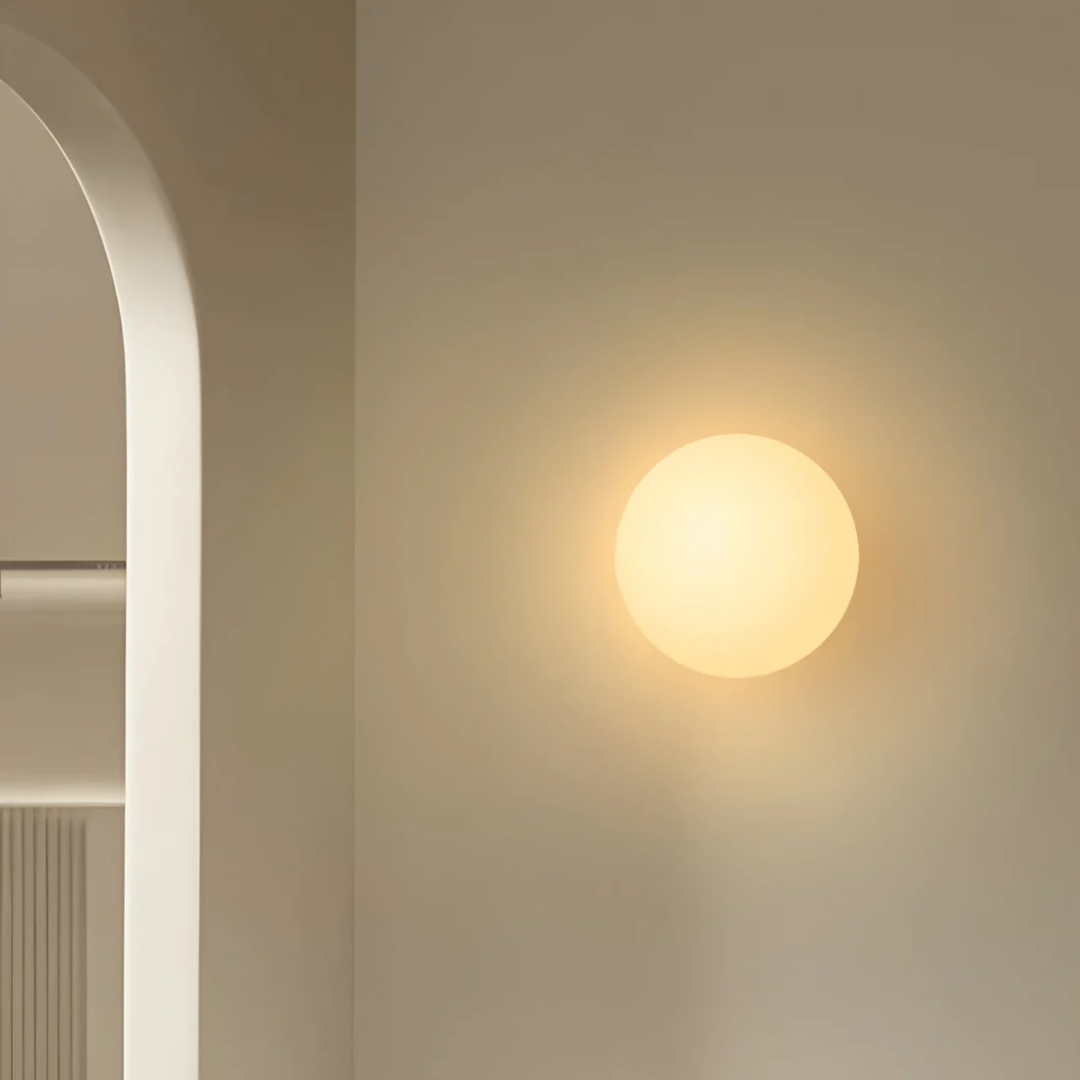 Pietra Luma | Applique da parete in vetro rotonda con luce LED bianco caldo