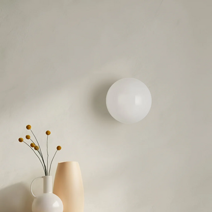 Pietra Luma | Applique da parete in vetro rotonda con luce LED bianco caldo
