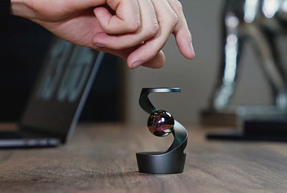 MindSpin | Juguete cinético de escritorio de aluminio, Ø 8 cm, sin pilas