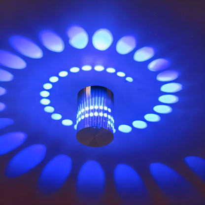 Lythera | Applique LED cilindrica con illuminazione a spirale colorata