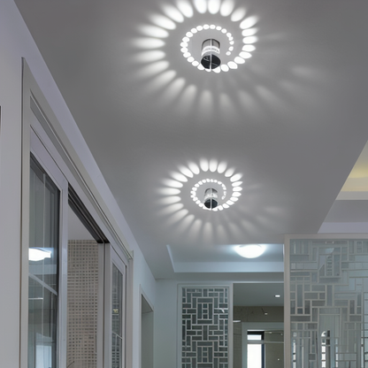 Lythera | Applique LED cilindrica con illuminazione a spirale colorata
