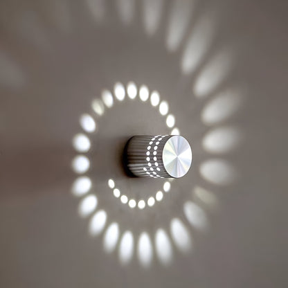 Lythera | Applique LED cilindrica con illuminazione a spirale colorata