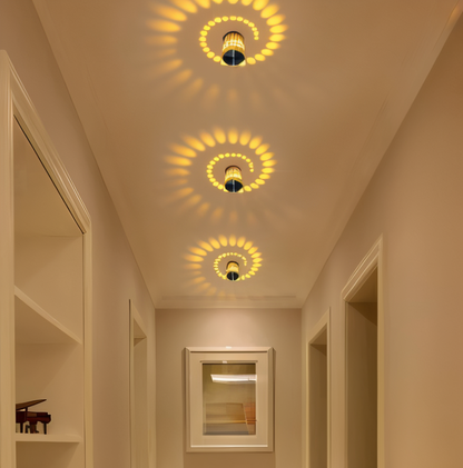 Lythera | Applique LED cilindrica con illuminazione a spirale colorata
