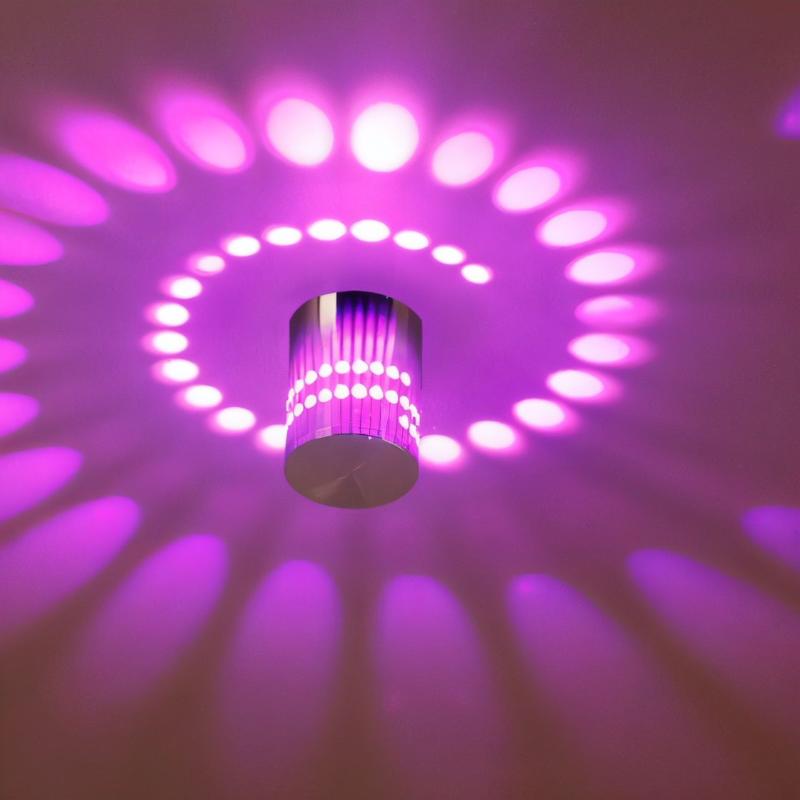 Lythera | Applique LED cilindrica con illuminazione a spirale colorata
