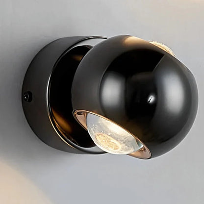 Lampada da parete LED Orbis – Lampada a sfera girevole in nero con orientamento luce a 360°