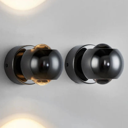 Lampada da parete LED Orbis – Lampada a sfera girevole in nero con orientamento luce a 360°