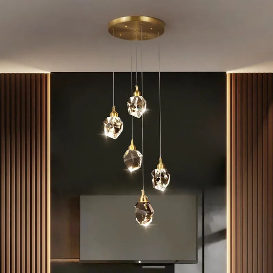 Suspension Nina – Plafonnier LED avec 5 abat-jours en verre cristal doré
