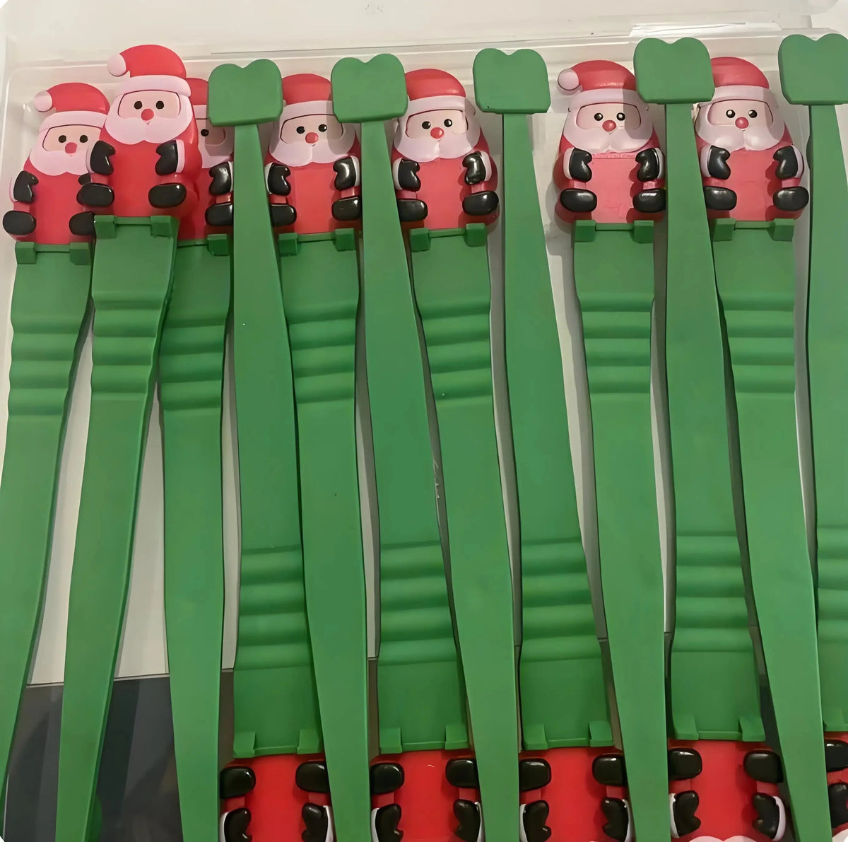 Klebino | Ganci adesivi in silicone a forma di Babbo Natale, set da 12 senza forare