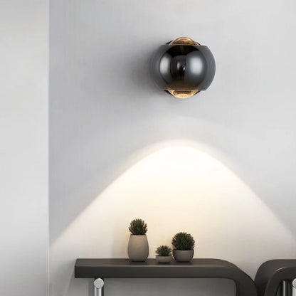 Lampada da parete LED Orbis – Lampada a sfera girevole in nero con orientamento luce a 360°