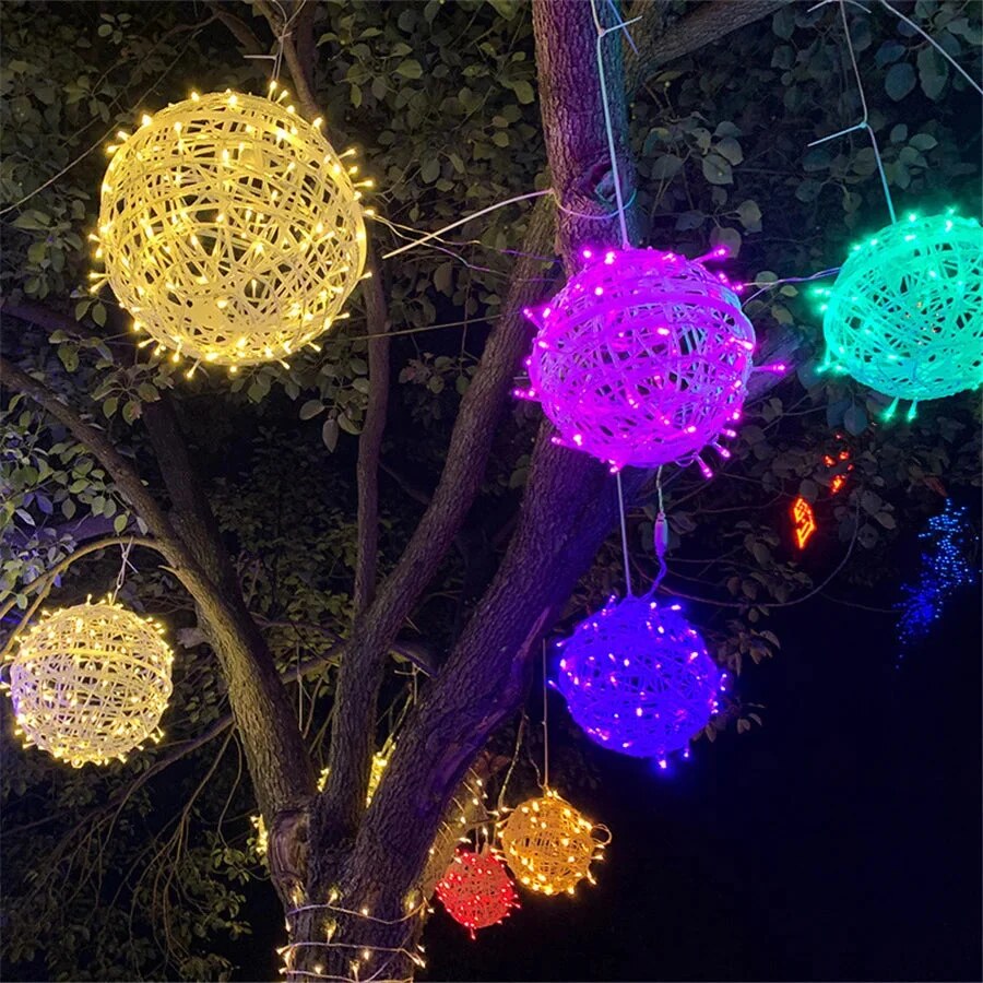 Lumirra | LED Lichterkette mit Rattankugeln, wetterfest für außen, mit Netzstecker