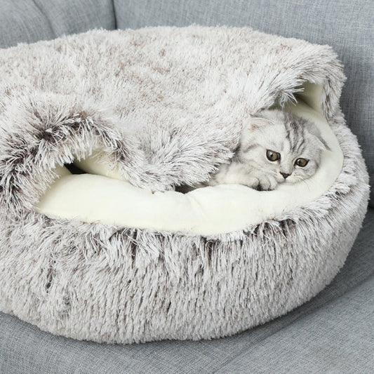 Acogedora cama cueva para mascotas con suave confort para gatos