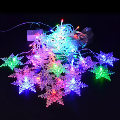 Flockara | LED Lichterkette mit 16 Schneeflocken, 8 Lichtmodi und IP44