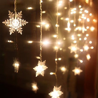 Flockara | LED Lichterkette mit 16 Schneeflocken, 8 Lichtmodi und IP44