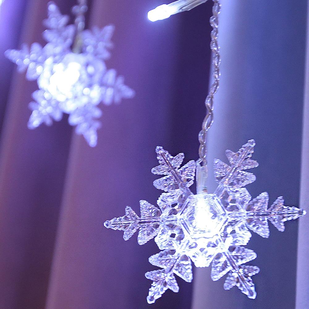 Flockara | LED Lichterkette mit 16 Schneeflocken, 8 Lichtmodi und IP44